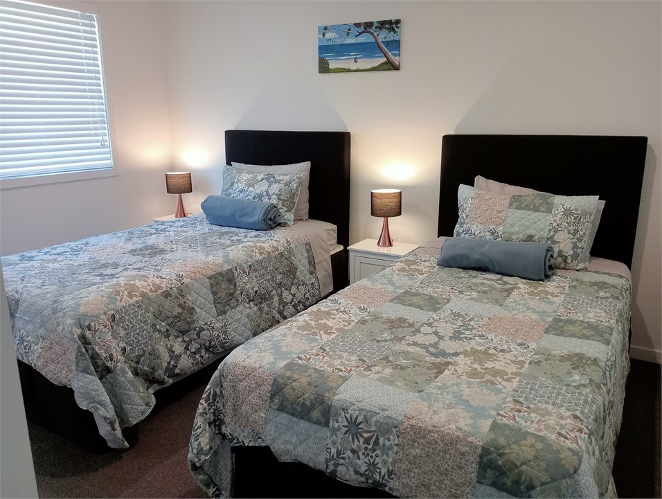 Bedroom 2 (x 2 king single beds)