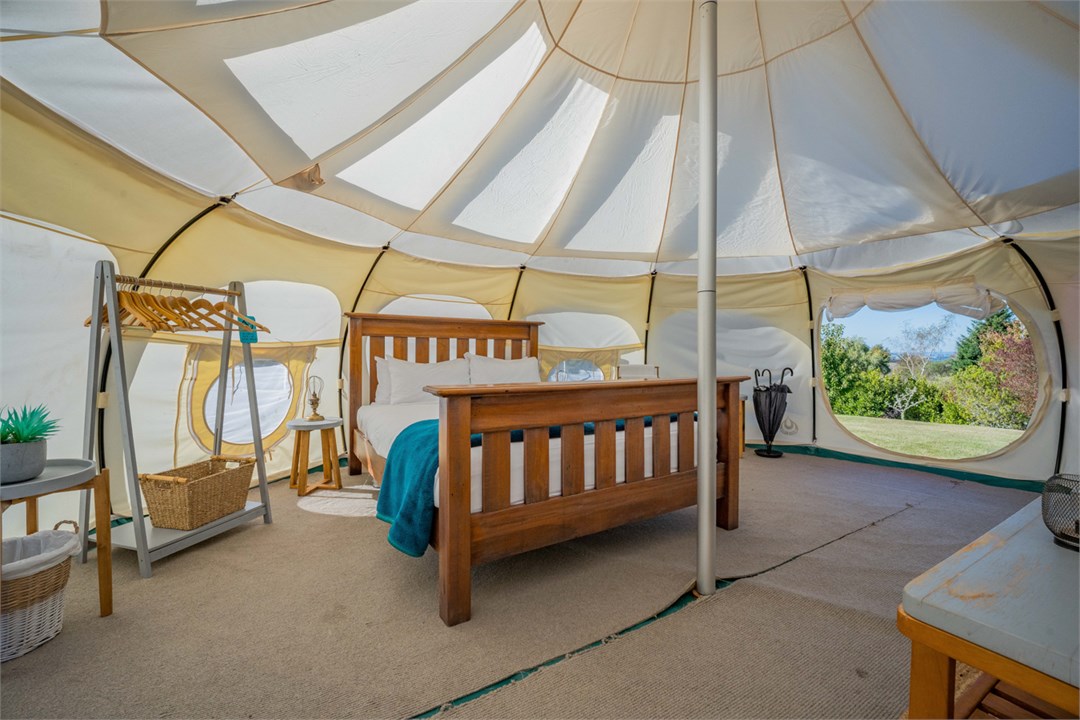 Glamping tent set up for dates in listing