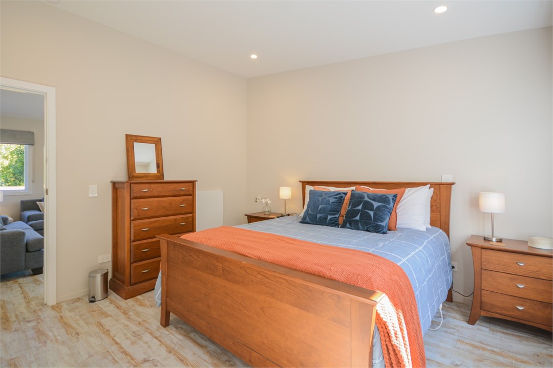 Bedroom 1 has a Queen bed