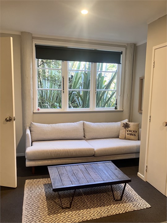 Back bedroom with additonal sofa for relaxation