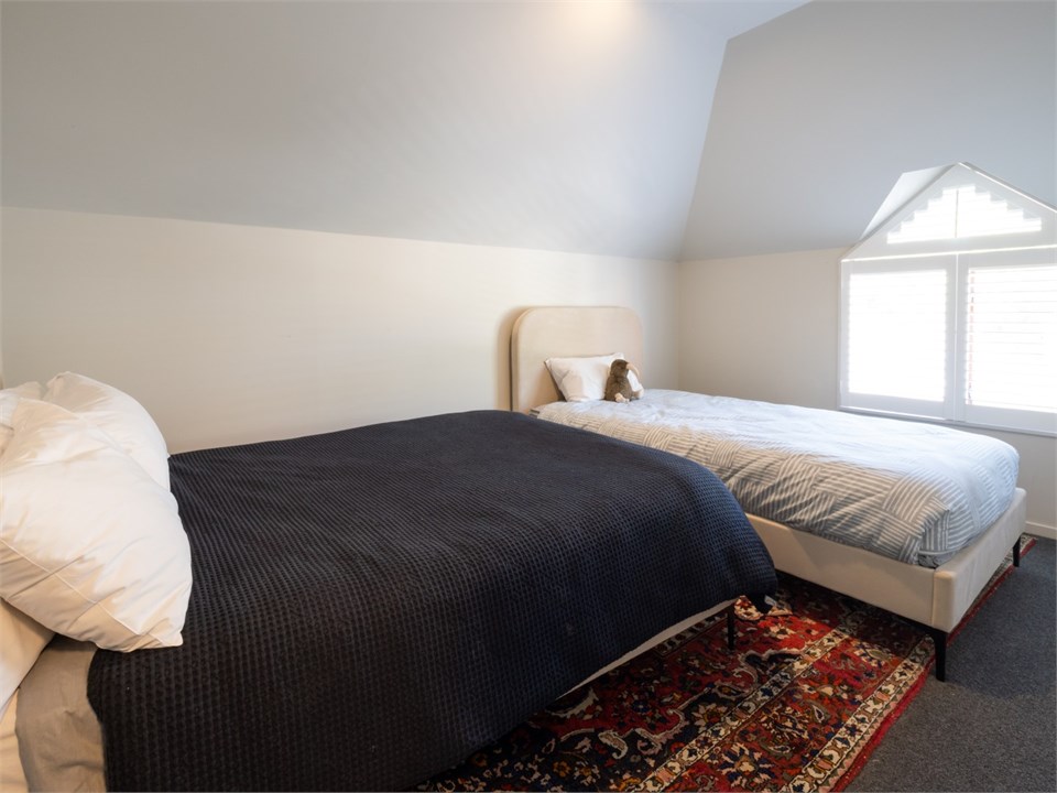 Light  second bedroom with a double and king singl