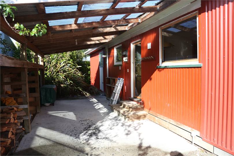 Carport with clothes line dry outside area for BBQ