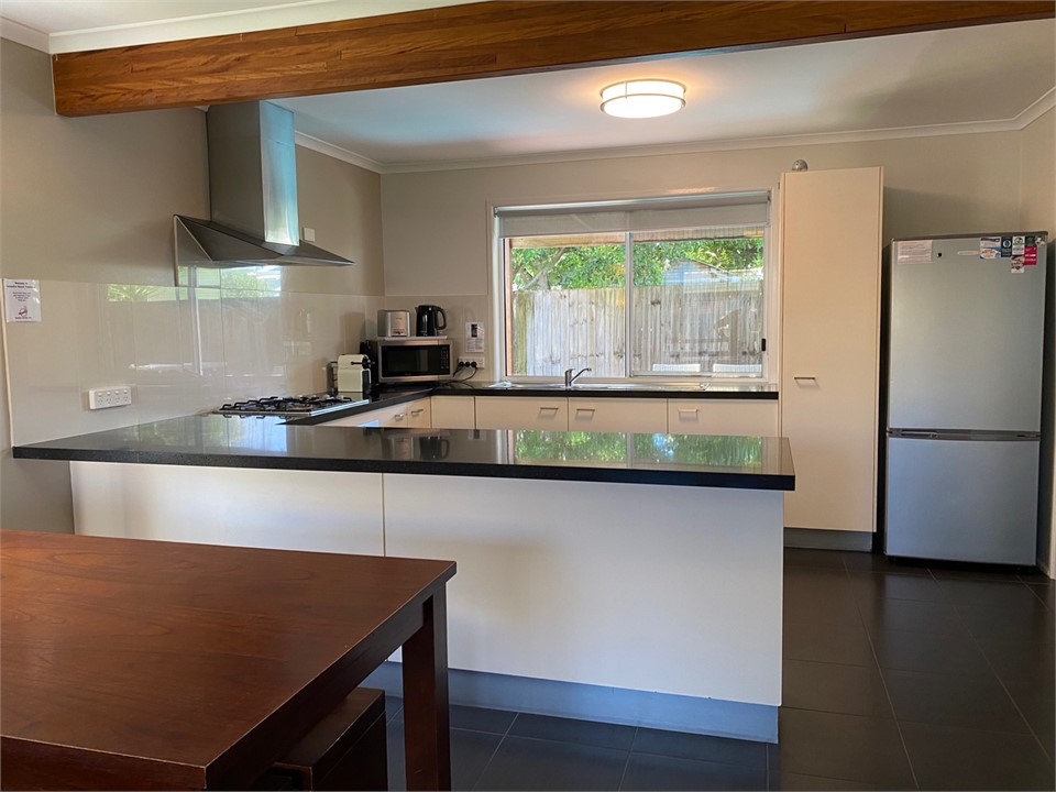 Kitchen - slide up flyscreen for ease of serving.