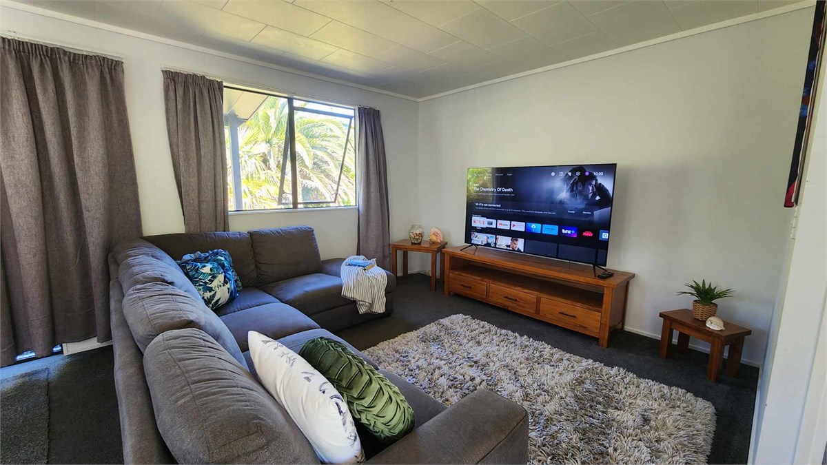 Comfy lounge suite with a smart TV.