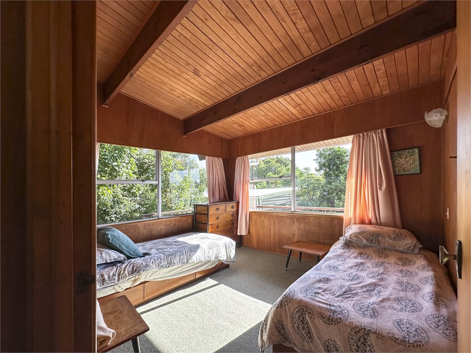 West bedroom with two single beds