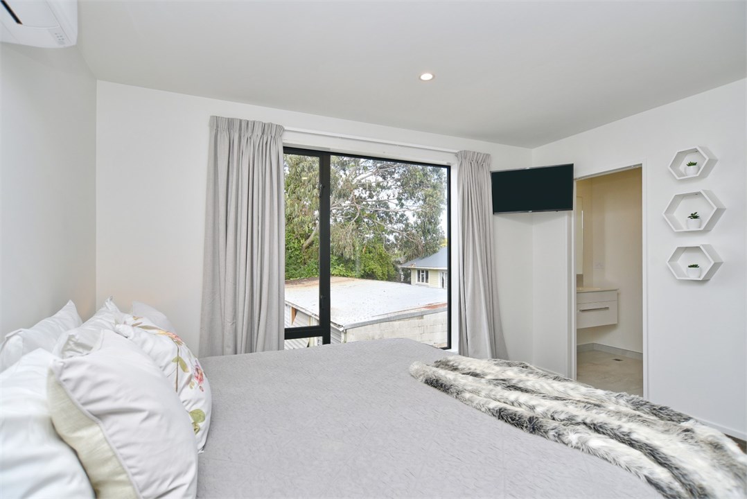 Bedroom 1 has a Super King bed and a TV