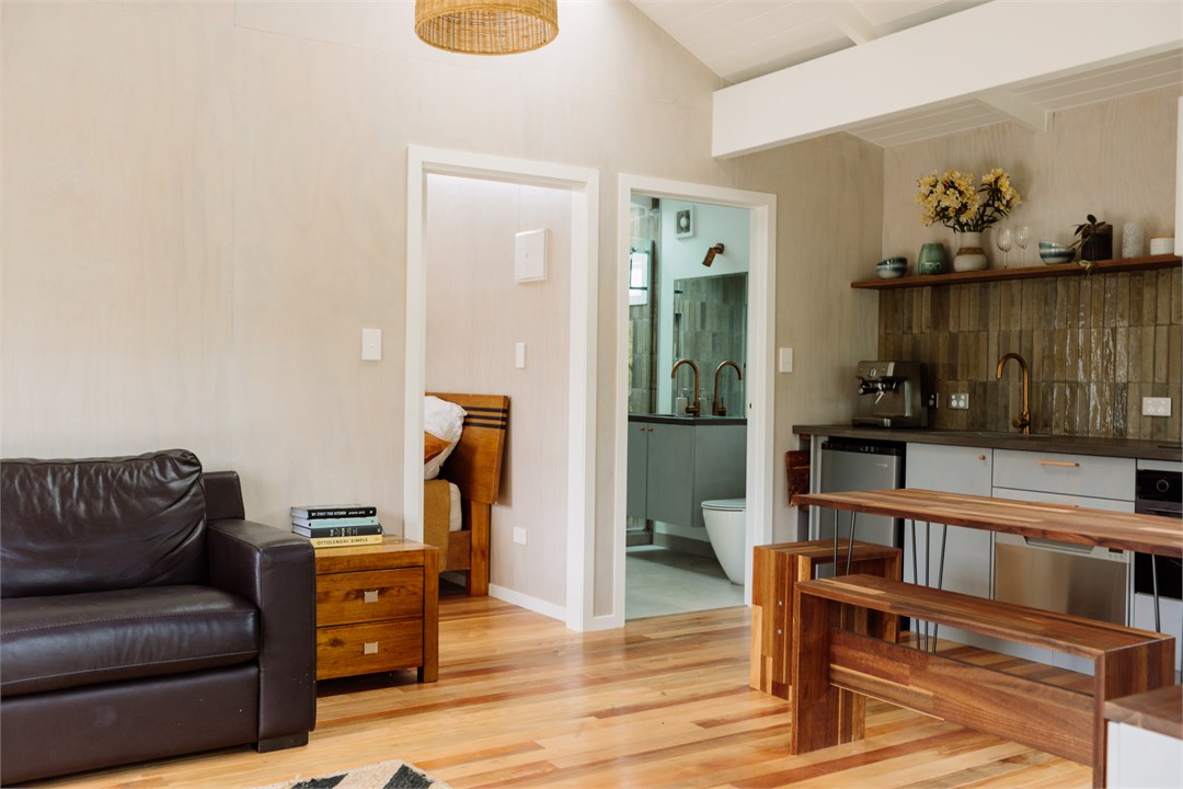 Open plan kitchen living area in cottage