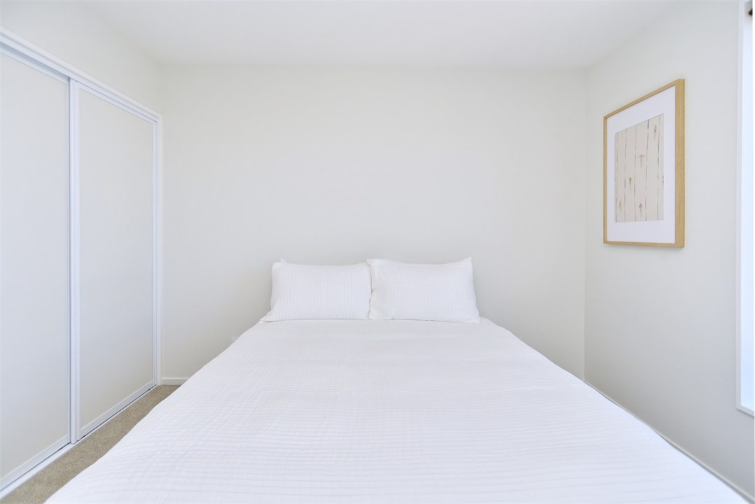 Bedroom 2 has a Queen bed