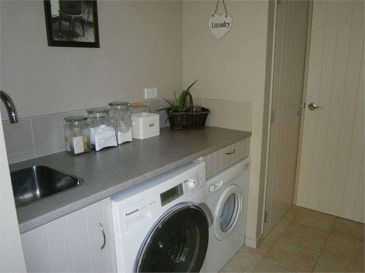 Full Laundry Facilities Upstairs & Wash Line outsi