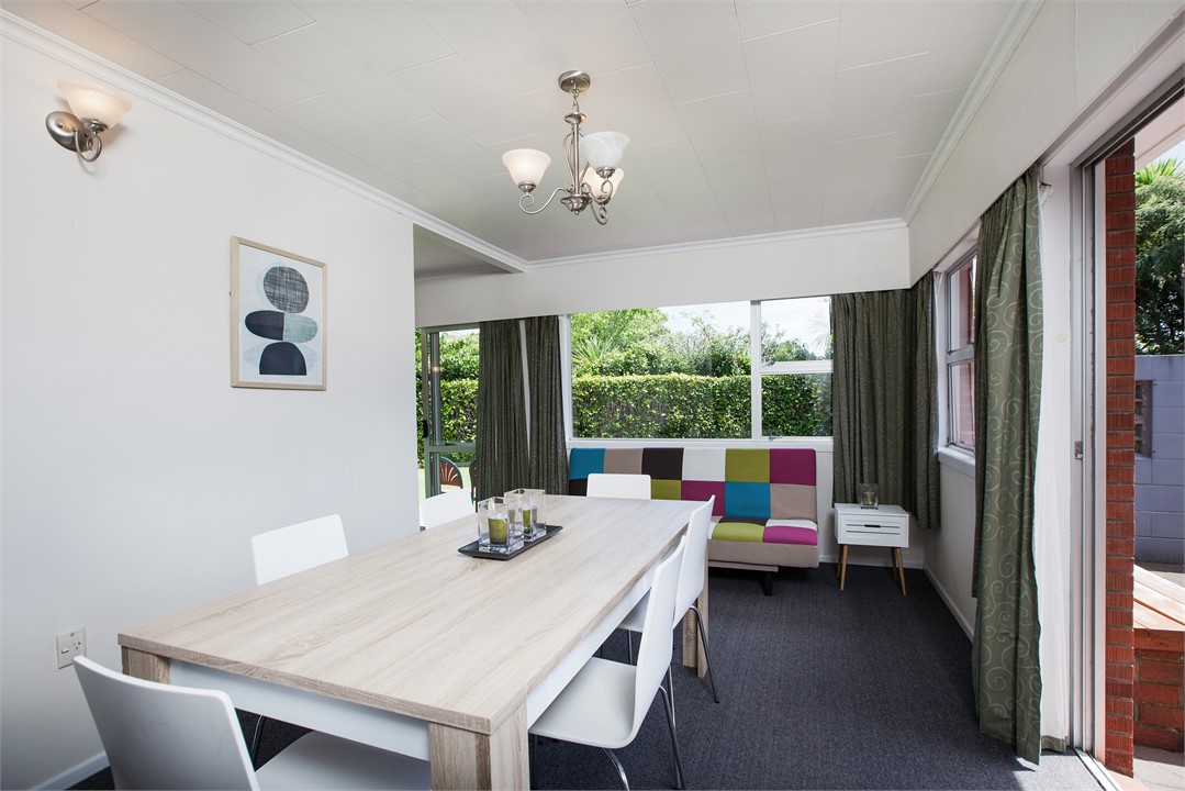 dining room with fold out sofa bed