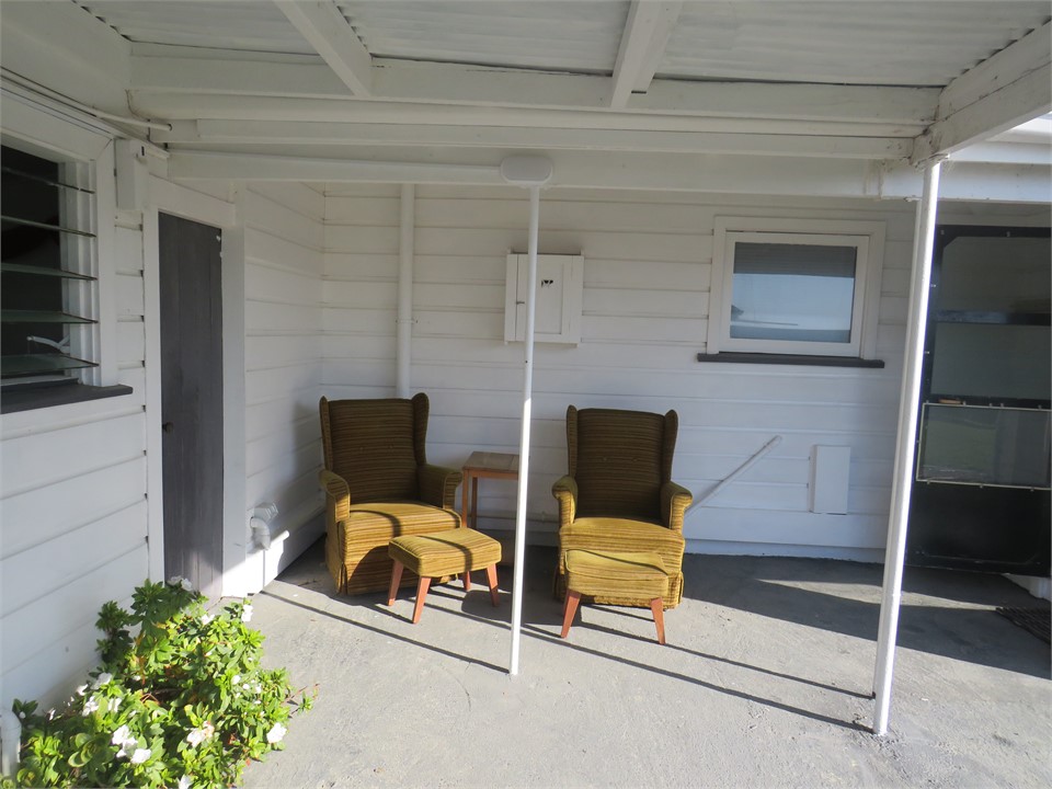 Back of house undercover for morning sun