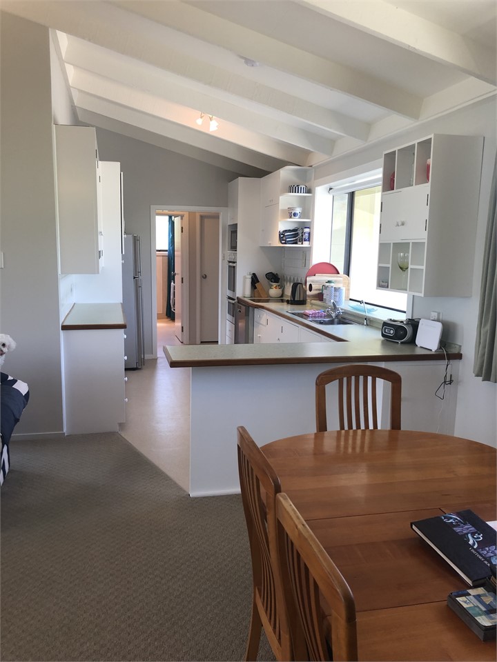 Kitchen from dining/lounge