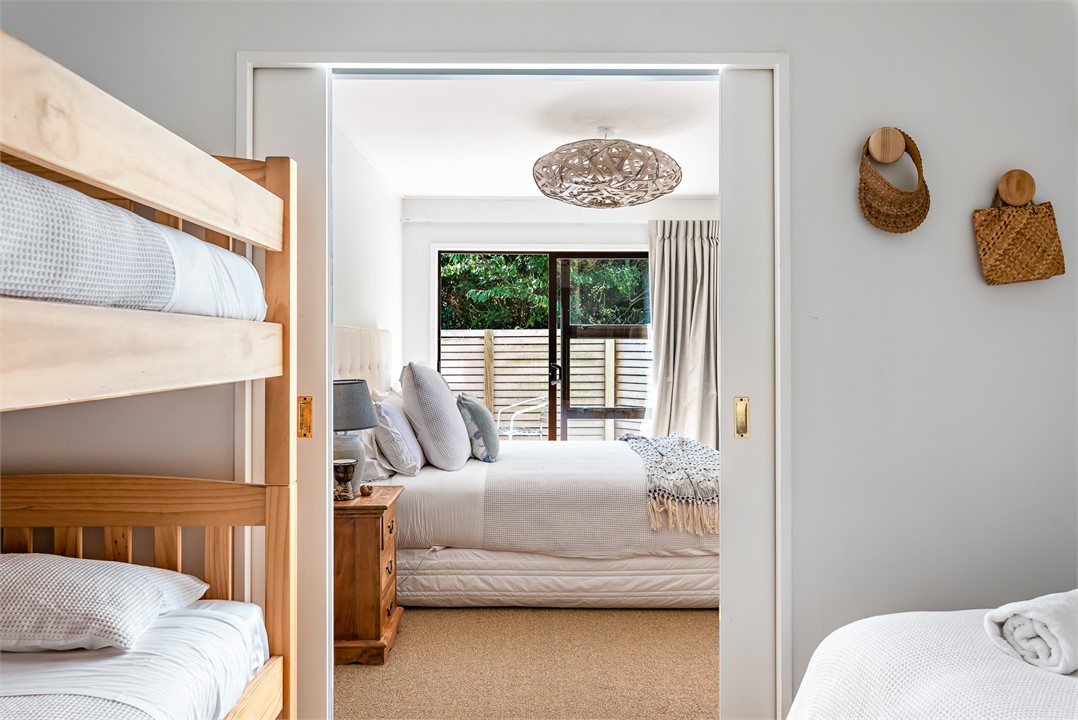 Bedroom 6 bunk room (3 king singles) through to be