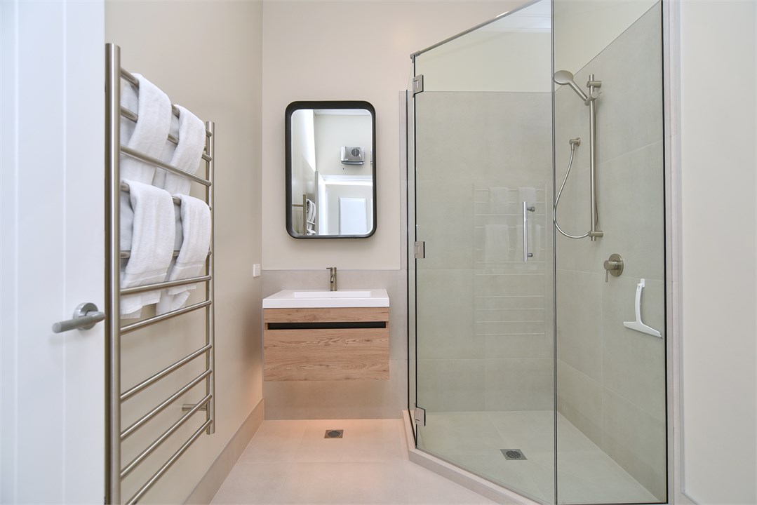 Bathroom has a shower and a toilet