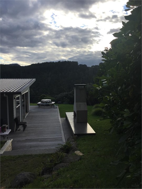 View from forest over deck and sunset views