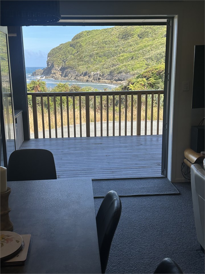 Double doors open to the deck