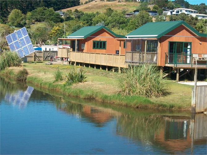 Right across quit road to beach & on the creek. Gr