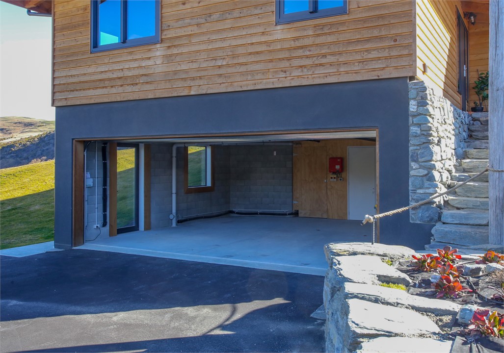 Large double garage with auto door