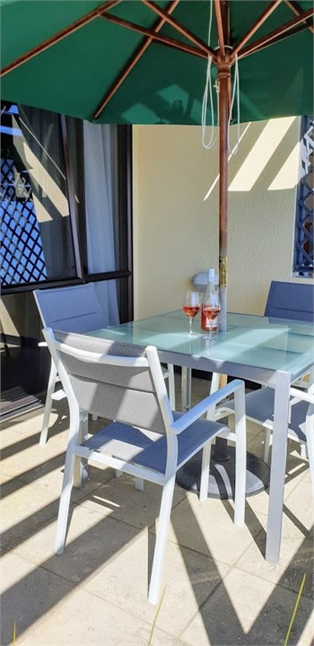 Table and chairs on private deck