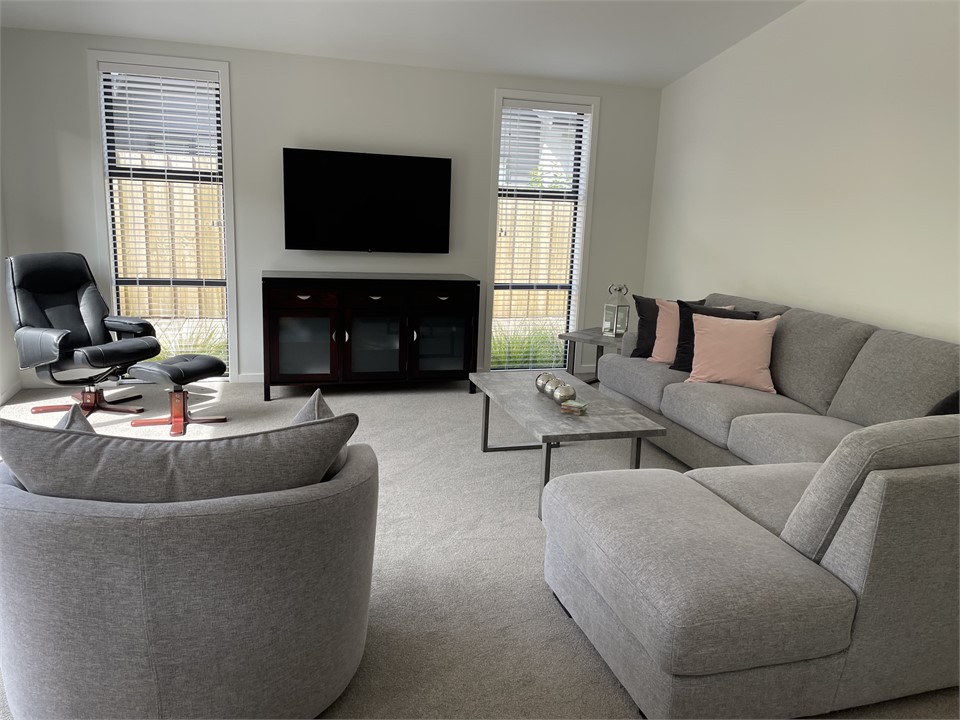 Lounge with a large and super comfy lounge suite t