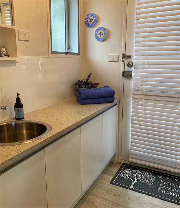 Downstairs bathroom with access to the spa