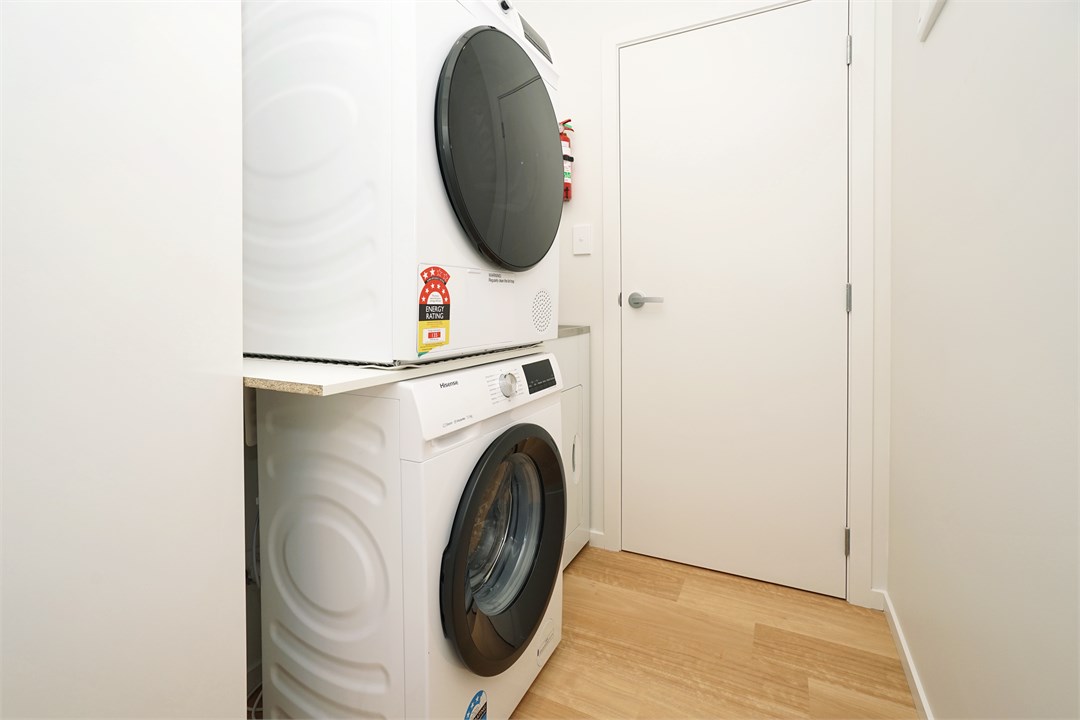 Laundry area with washing machine and dryer
