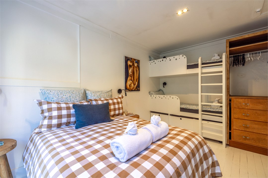 Double bed and a set of bunks