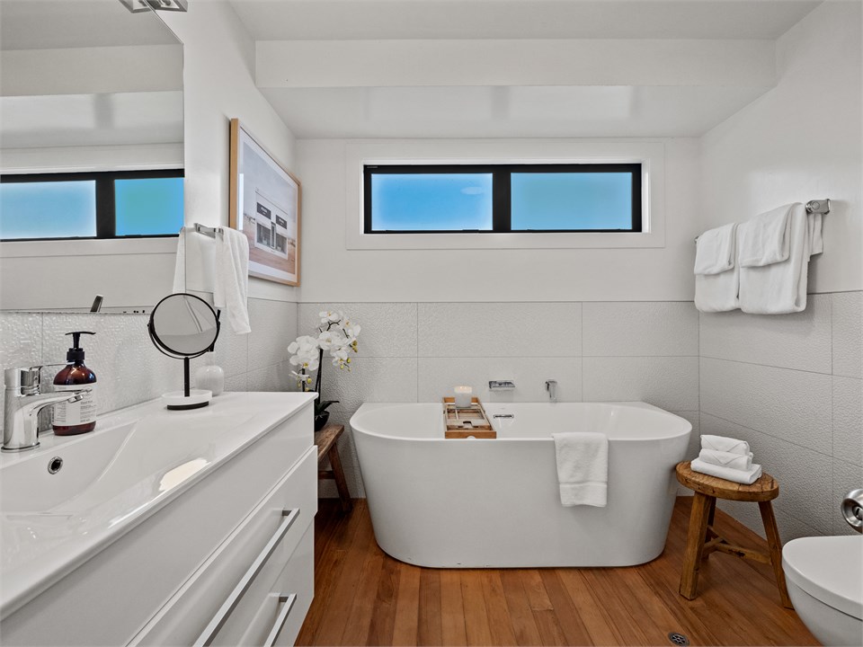 Bathroom 1 with large luxurious tub.