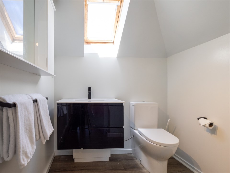 Light and clean main bathroom