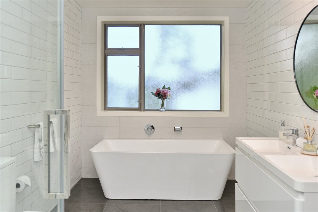 The master bathroom includes a lavish bathtub - a 