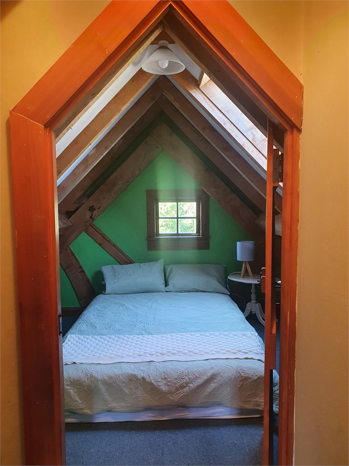 Sleep under the beams in one of the two attic bedr