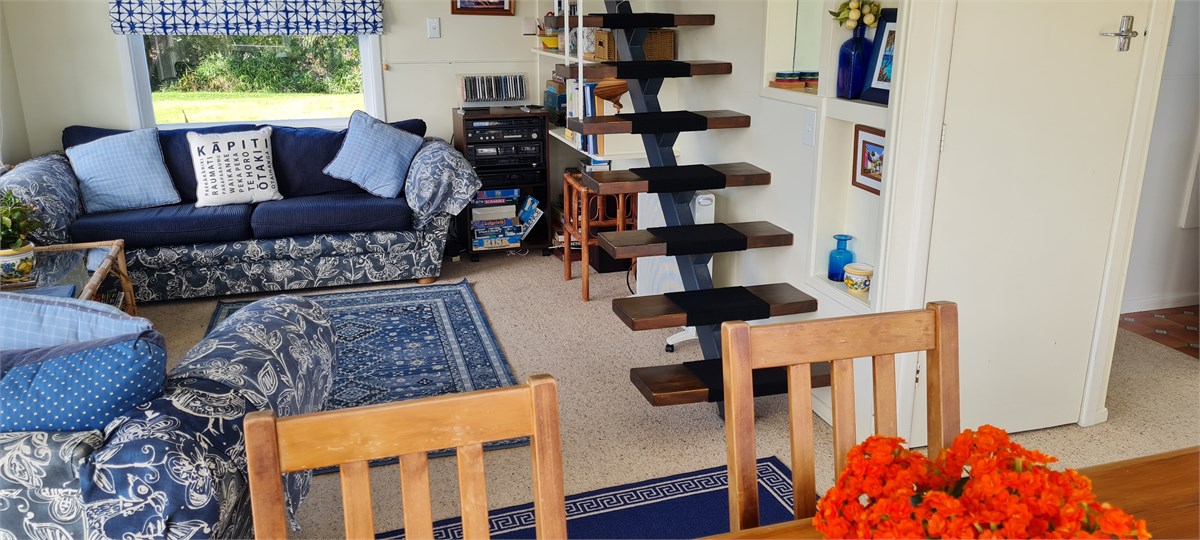 Wooden stairs have carpet tiles