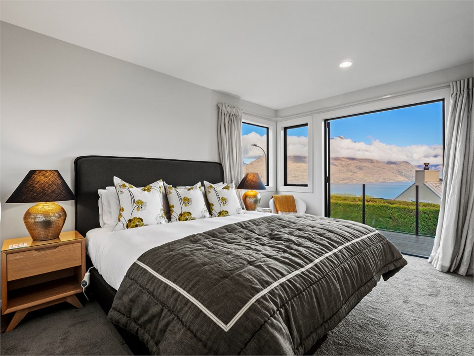 Bdrm 1 opens to front deck. Can split to singles