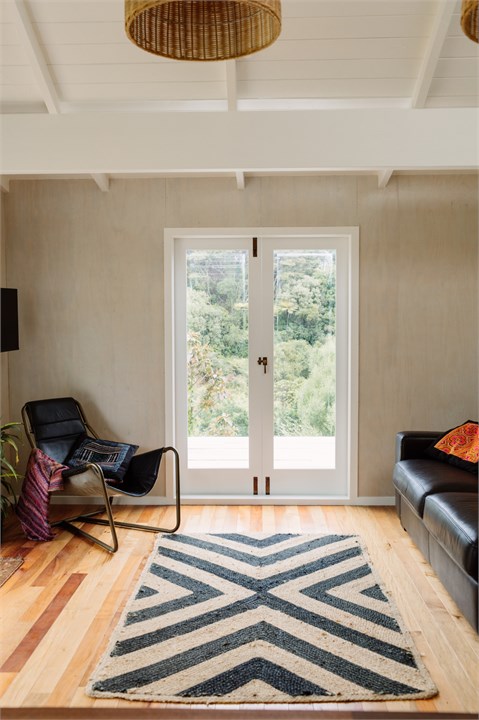 Open plan kitchen living area in cottage
