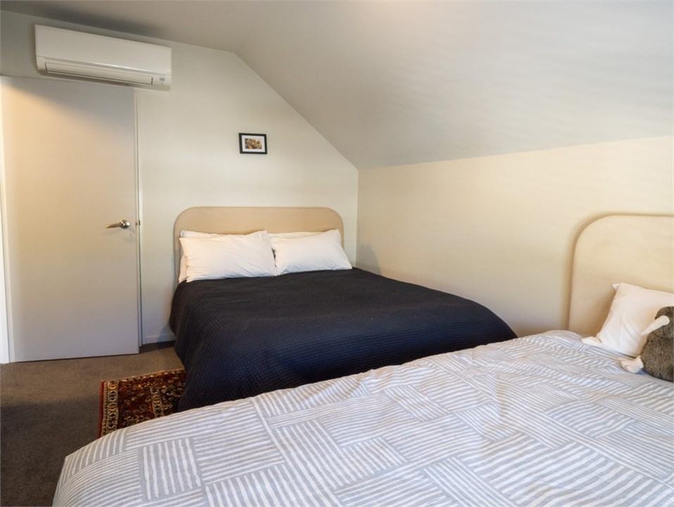 Light second bedroom with a double and king single