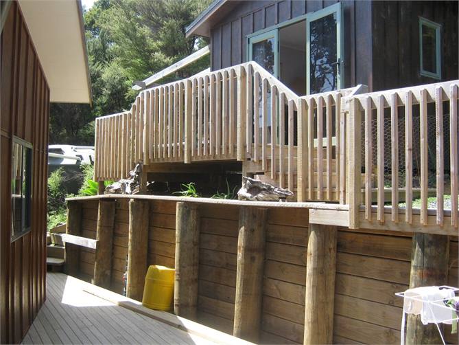 View of back deck and third bedroom