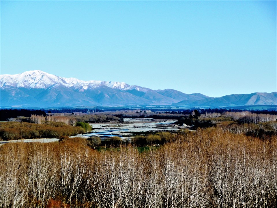 The Oreti Valley shows a glacial river.