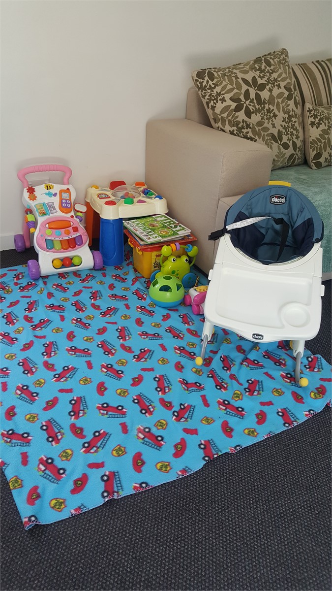 Toys, books and games available. Portable highchai