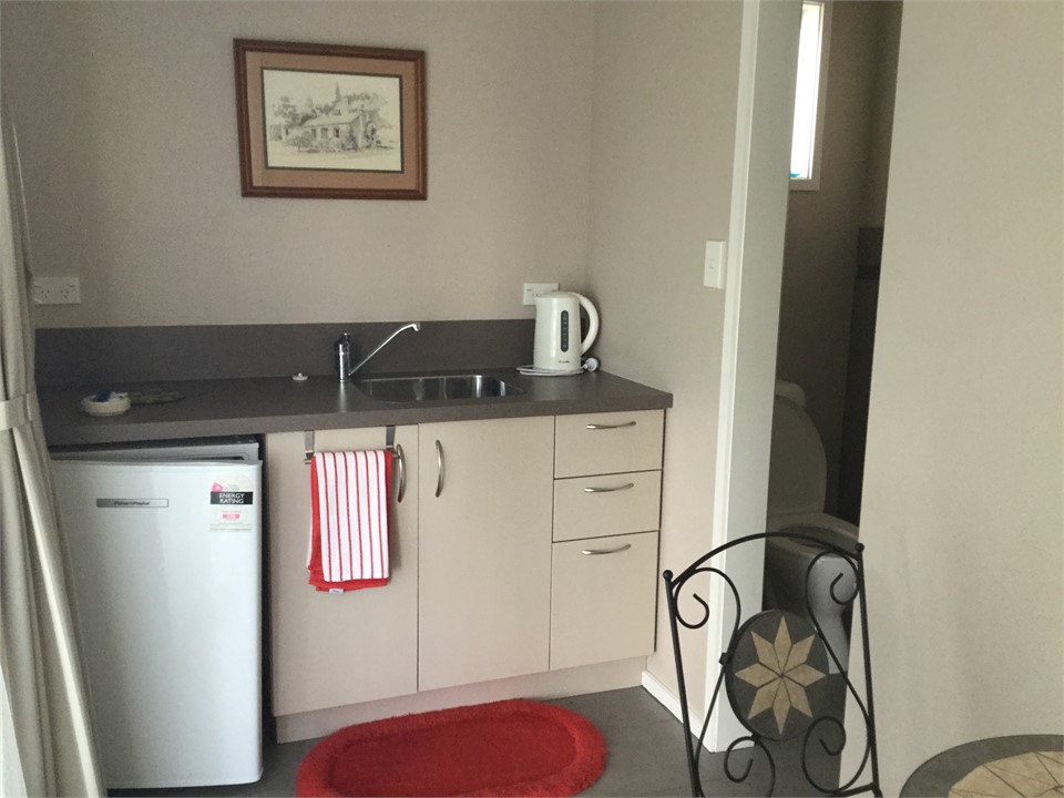 Kitchenette with microwave, toaster and kettle