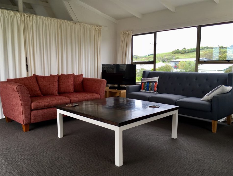 Living area with curtains drawn