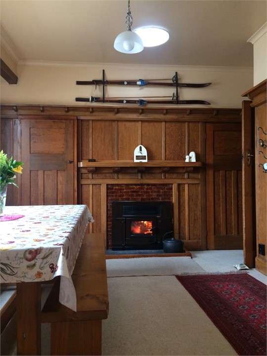 Dining room with yunca woodburner