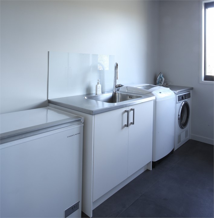 Roomy laundry with big freezer