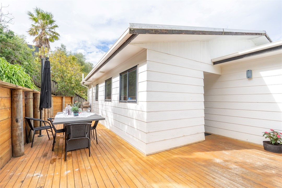 Seating area and view of property building