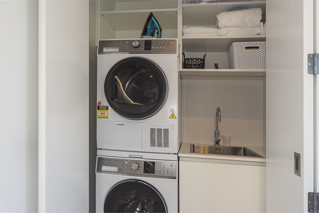 Laundry with Washer, Dryer, Tub, Iron & Ironing Bo