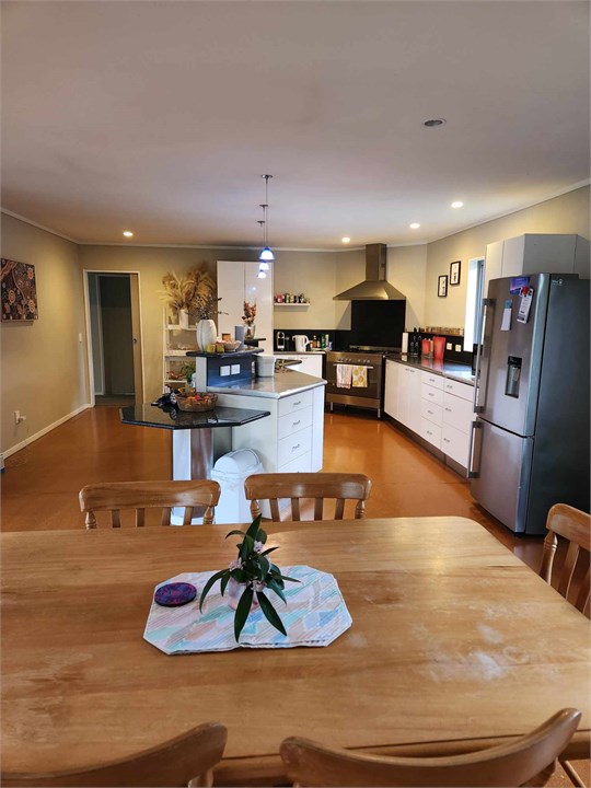 Dining table and kitchen