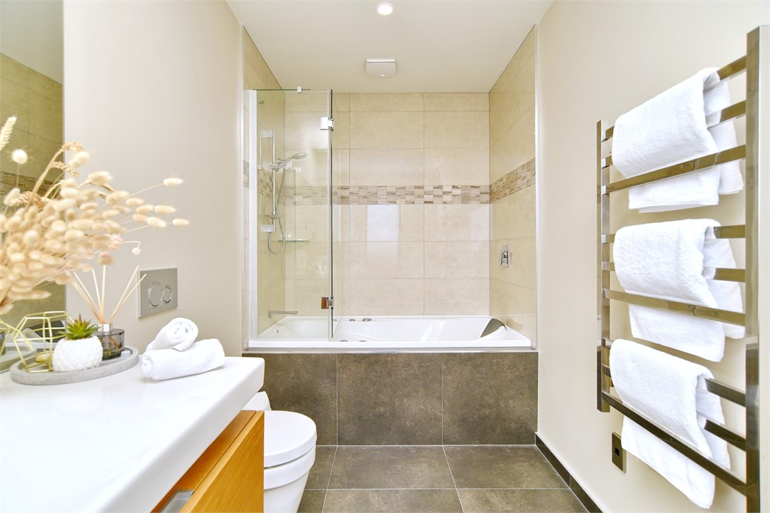 Bathroom 2 - Has a shower and a bath