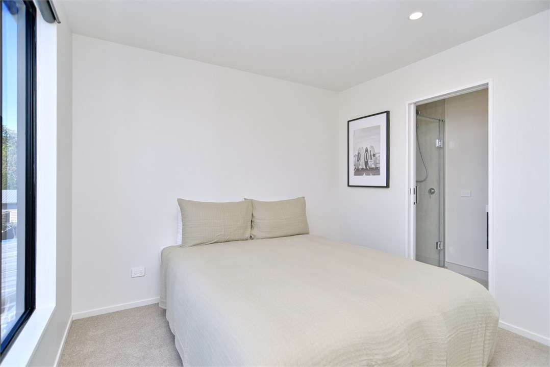 Bedroom 3 has a Queen bed