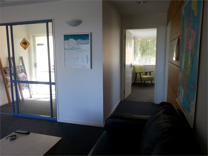 Looking along hall to queen room from couch