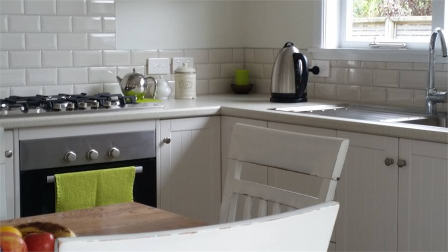 Large french doors off kitchen/dinning - lrg deck