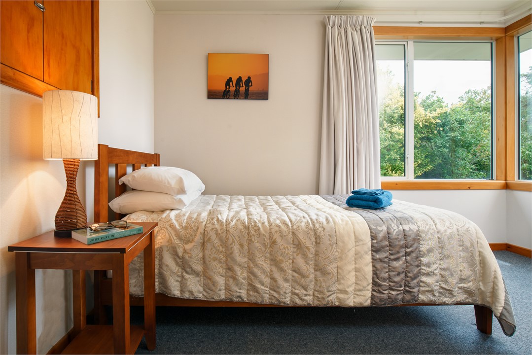 The third bedroom has a king single bed.